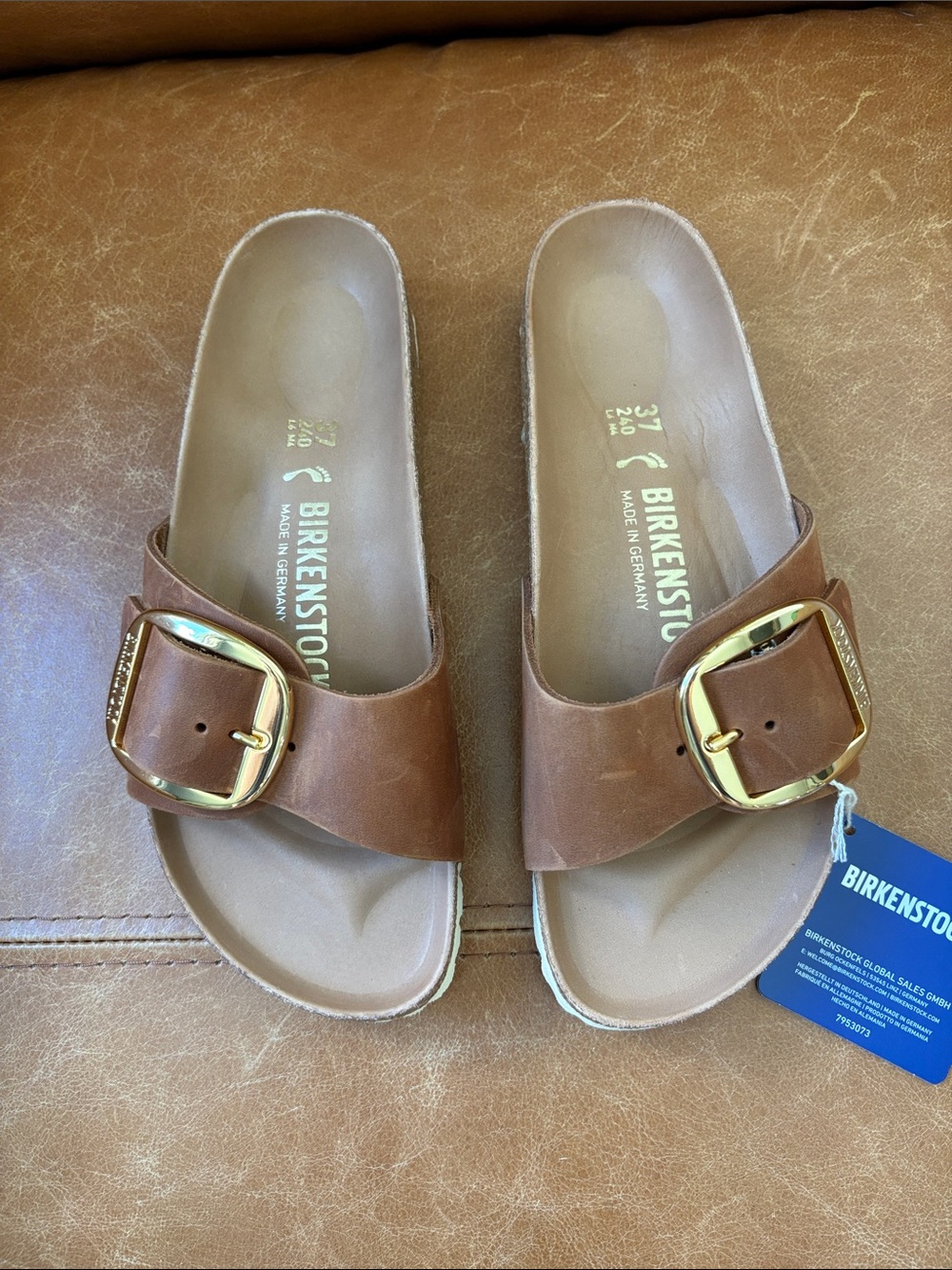 Birkenstock Women's Tan Slide Sandals with Gold Buckles